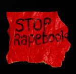 A hand-draw sign that says 'Stop Rapebook'.